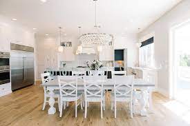 Have an eye for glamor? White Dining Table With Gray Top And Turned Legs Transitional Kitchen