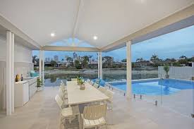 Sandy Cove Luxury Gold Coast Holiday Homes Beach Waterfront Goldcoast Australia Holidayhome Outdoor Table Holiday Home House Styles Coastal Lifestyle