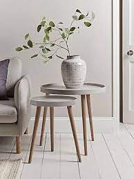 A classic glass side table can give your space a sense of glamour. Pin On Living