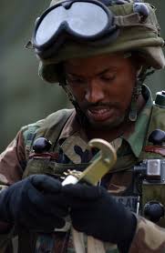 U.S. Air Force STAFF SGT. Gregory Moore, 375th Aeromedical Evacuation  Squadron, Scott Air Force Base, Ill., helps break down the Mobile  Aeromedical Staging Facility located at C-MED (Charlie Medical) at Ft. Polk,