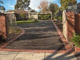 Custom asphalt specialises in asphalt driveway construction and design, providing either hand laid or machine laid asphalt driveways throughout melbourne. Feature Asphalt Driveways And Landscaping Asphalting Melbourne Topcat Driveways
