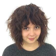 Those who wonder how they can soften the angles of their pointed face shapes, don't look any further than rounded bob with bangs. 40 Refreshing Variations Of Bangs For Round Faces