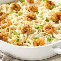 Add garlic, shrimp, and parsley and season with salt. Baked Chicken And Shrimp Alfredo Dave And Busters Recipes Tasty Query