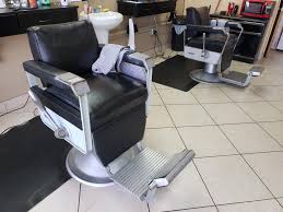 60 year old Barbers chairs. My father and I have been putting them to good  use for the past decade. They still have ashtrays, and they feel like  rotating a tank turret