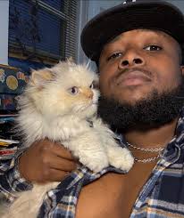 Me and my cat lil Parmesan wanted to drop in to let you know we care and to  ask yall do we look alike! Just in case you needed it