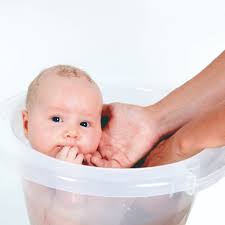Next, bring your baby to the bath area and undress them completely. About Us Tummy Tub