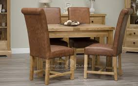 Fully extended, it easily seats ten people comfortably. Melford Solid Oak Butterfly Extending Dining Table Edmunds Clarke Ltd