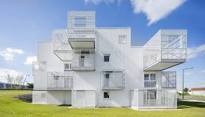 White Caged Balconies Project From The Sides Of This Social Housing Block By French Collective Poggi Social Housing Social Housing Architecture Architecture