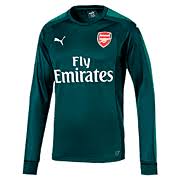 In dem rot gehaltenen bereich sind zudem mittelgroße weiße punkte zu sehen. Arsenal Trikot Archiv Subside Sports