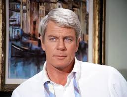 Mission: Impossible (1970). STANDING (L-R): Greg Morris, Sam Elliott, Peter  Lupus, Leonard Nimoy. SITTING (L-R): Lesley Ann Warren, Peter Graves.