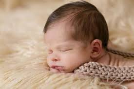 Does the language of a lullaby play a role in soothing infants?