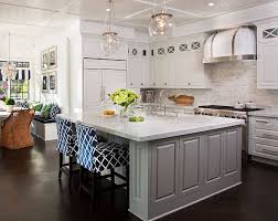 Island Mindful Gray 7016 Sherwin Williams Spacious Beach House With Coastal Interiors Beadboard Kitchen Grey Kitchen Island Kitchen Design