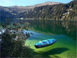 بحيرة أرنينزي arnensee في ولاية بيرن في سويسرة تشكلت من بناء سد في عام 1942 لتجميع مياه الأنهار التي تصب في ا places to travel places to see places to visit