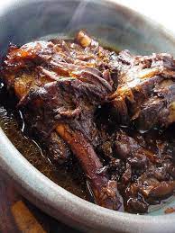 Slow Cooked Spiced Lamb Shanks With Dates Braised Lamb Shanks Lamb Recipes Goat Recipes