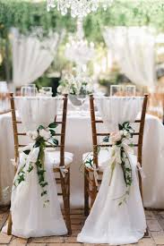 Tips For Low Budget Wedding The Most You Save When You Reduce Your Guests Diy Wedding Wedding Chair Decorations Wedding Chair Sashes Wedding Decorations