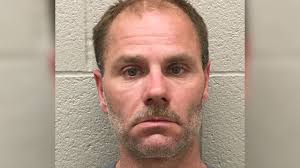 Man arrested after pointing gun at Food Lion employees, demanding cash