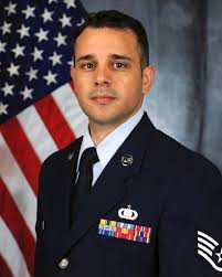 Senior Airmen Ashley Powell, from Air Force Television at the Pentagon,  captures b-roll footage during the production of There Are No Words.