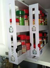 The Pull Out Spice Rack From Bed Bath Beyond With Diy Labels Organizes My Cabinet And Al Kitchen Cabinet Storage Cabinet Organization Diy Diy Storage Cabinets