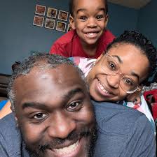 The theme is a throwback to the '80s. There are video games, neon signs,  and old commercials playing