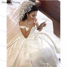 What does a ball gown wedding dress look like? Glitter In Dubai Princess Ball Gown Wedding Dresses Saudi Arabian Satin Bridal Gown With Bling Bling Beading Crystals Appliques Wedding Dresses Aliexpress