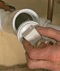 replace a trap, and add a cleanout