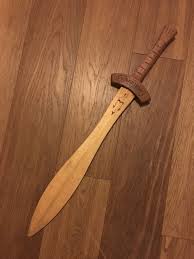 Wooden Sword Riptide From The Percy Jackson Books Made For A Friends Son For His Birthday Wooden Sword Woodworking For Kids Woodworking Basics