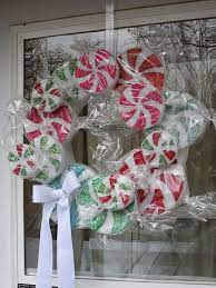 My 5 year old granddaughter joined in on the fun. Peppermint Candy Wreath Crafts By Amanda Candy Wreath Christmas Wreaths Christmas Decorations