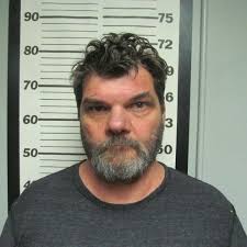 Man shot by homeowner after being caught peering into window