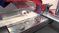Cutting marble with manual tile cutter