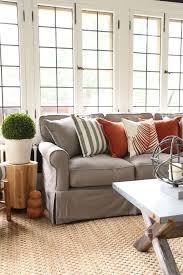 Pretty Gray Sofas Decorating For Fall Farmhouse Style Decorating With Black Gray Slipcovered Sofa Living Room Living Room Decor Tips Fall Living Room Decor