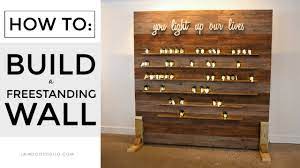 To frame a wall, you must choose the wall's location, build the wall flat on the floor and then tilt it into place. How To Build A Freestanding Display Wall Youtube