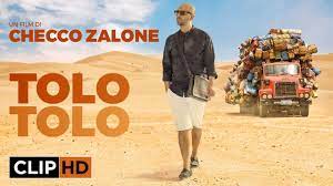 He finds a job in a tourist resort where he meets idjaba (manda touré) and oumar. Tolo Tolo Immigrato Youtube