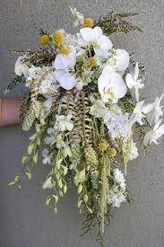 We also offer floral wedding packages & tips on wedding flowers trends. An Earthy Beach Wedding Cascading Wedding Bouquets Wedding Bouquets Unique Bridal Bouquets