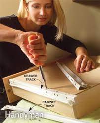 Start off by fully removing the drawer and then unscrewing the slides for a better look. Kitchen Cabinets 9 Easy Repairs Diy Family Handyman