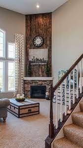 Add Charm In Your House With A Corner Fireplace Corner Fireplace Living Room Comfy Living Room Decor Home Fireplace