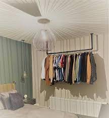 This clothing rack measures 62 inches tall and 42.5 inches wide, but the hanging rod expands to 66.75 inches. Pin On 2020 House Ideas