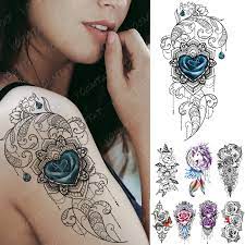 Rose and butterfly tattoo butterfly drawing butterfly tattoo designs tattoo flowers butterfly wings rose heart tattoo feather drawing thinking of getting a meaningful tattoo? Waterproof Temporary Tattoo Sticker Lace Heart Flower Unicorn Flash Tattoos Rose Butterfly Body Art Arm Fake Sleeve Tatoo Women Temporary Tattoos Aliexpress