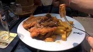 The breaded schnitzel is popular in many countries and is made using veal, pork, chicken, mutton, beef, or turkey. Pork Schnitzel With Mushroom Sauce Jagerschnitzel Bild Von Brauhaus Zum Prinzen Koln Tripadvisor
