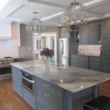 White Granite Looks Like Marble White Fantasy Granite Kitchen Remodel Countertops Kitchen Cabinets Grey And White Contemporary Kitchen