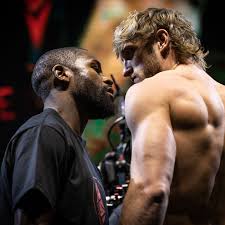 Logan paul, yellow shorts, and floyd mayweather face off at saturday's weigh in. Msk6 Lp1 1oidm