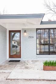 Painting your exterior brick can give your home's look an overhaul, but there are important factors to consider when making such a drastic change you can transform a red, orange or yellow brick home with a dark colour like grey to create drama, or use a classic white for a crisp, clean, scandinavian look. Painted Brick Facades For Instant Curb Appeal