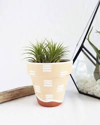 Black And White Painted Clay Pots Hand Painted Terra Cotta Pot Tan And White Or Tan And Black Etsy In 2020 Plant Pot Diy Plant Pot Design Painted Terra Cotta Pots