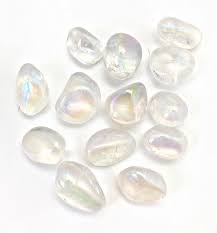 Because of its strength and abundance, quartz is a popular and reliable choice for countertops. Angel Aura Quartz Crystal Tumbled Stone Angel Aura Stone Etsy