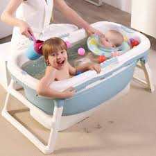 Ideal for a newborn, these infant bathtubs are smaller and fit inside or over a kitchen sink. Plastic Baby Bath Tub Foldable Bath Swimming Pool Children Bath Bucket Folding Bath Bucket Large Bathtub Neonatal Swimmer Baby Tubs Aliexpress