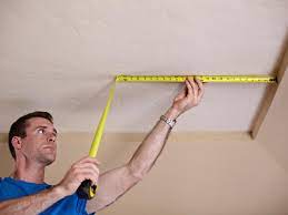 Paint a panel design up walls and along beams. How To Install Tin Ceiling Tile How Tos Diy