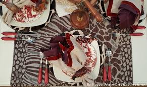It makes a bold statement about who you're identifying yourself to be. On Safari An African Safari Themed Tablescape Between Naps On The Porch