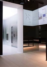 At The Centre Of Gaggenau S Eurocucina 2016 Booth A Glass Cube Reminiscent Of An Art Exhibition Displayed The Brand S In Gaggenau Glass Cube Innovation Centre
