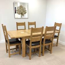 Solid oak extending dining table in excellent condition. Texas Oak Extending Dining Table 4 Chairs Moon Furniture