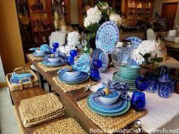 For this groom and groom's blue and orange wedding, it came as no surprise that the settings were right on theme. Memorial Day Entertaining And Table Setting Ideas Between Naps On The Porch