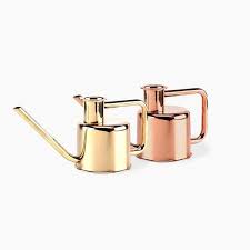 It's compact, but with a 1 liter capacity holds plenty of wat. Solid Metal Watering Can Apollobox